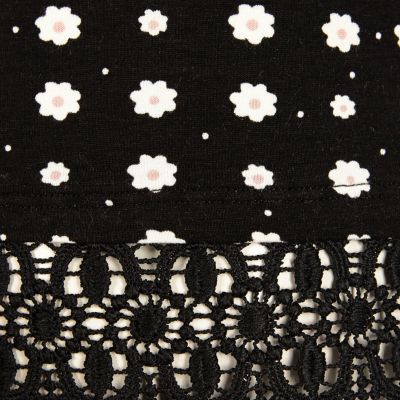 Girls black daisy print lace hem top